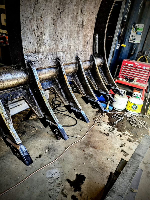 CWB certified welder on heavy industrial equipment in BC